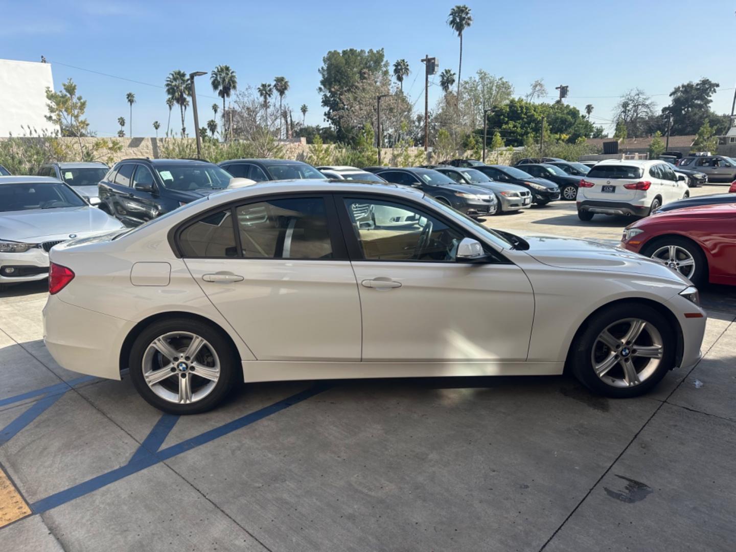 2012 WHITE /Tan BMW 3-Series Leather (WBA3C1C59CF) with an 4 Cylinder engine, Automatic transmission, located at 30 S. Berkeley Avenue, Pasadena, CA, 91107, (626) 248-7567, 34.145447, -118.109398 - Low Miles!! this 2012 BMW 3-Series 328i Sedan looks and drives well. Are you in search of a reliable and stylish vehicle in Pasadena, CA, but concerned about your credit history? Look no further! We have this impressive 2012 BMW 3-Series 328i Sedan with low miles available at our dealership. We unde - Photo#6